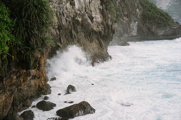 Natural views of Nusa Penida. Rocks and ocean. Peguyangan temple in Nusa Penida Island - Bali. Peguyangan Waterfall