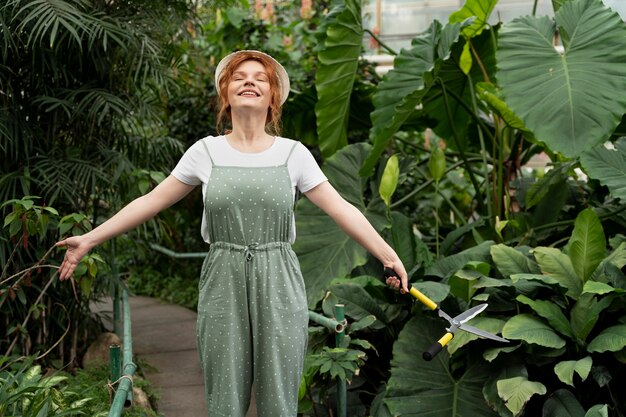 Nature lover working in a greenhouse