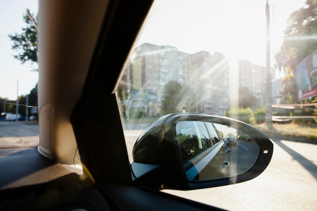 Free photo neighborhood view from lateral window of car