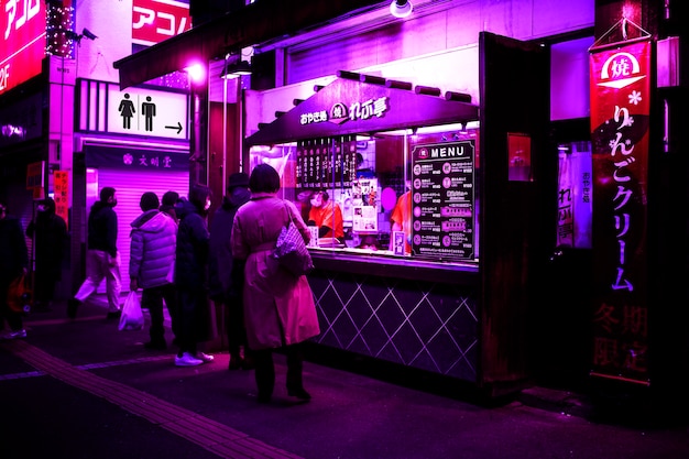 Free photo neon light bathroom sign at night