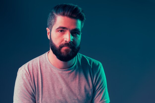 Neon portrait of a young attractive man