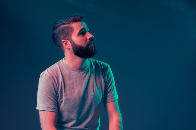 Neon portrait of a young attractive man