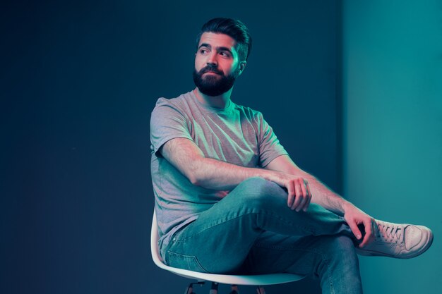 Neon portrait of a young attractive man