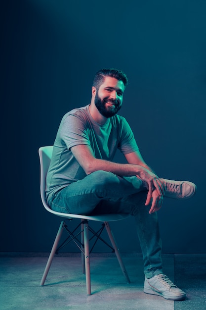 Neon portrait of a young attractive man