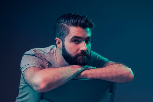 Neon portrait of a young attractive man