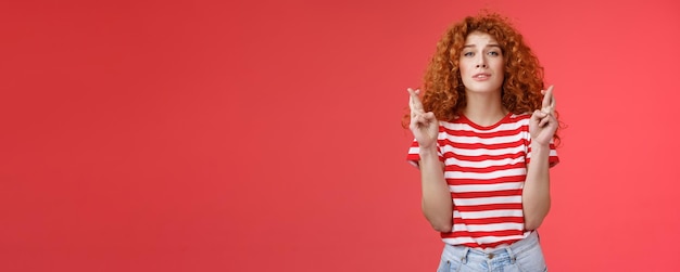 Free Photo nervous young silly timid cute redhead ginger girl anticipating hopeful results believe praying squi