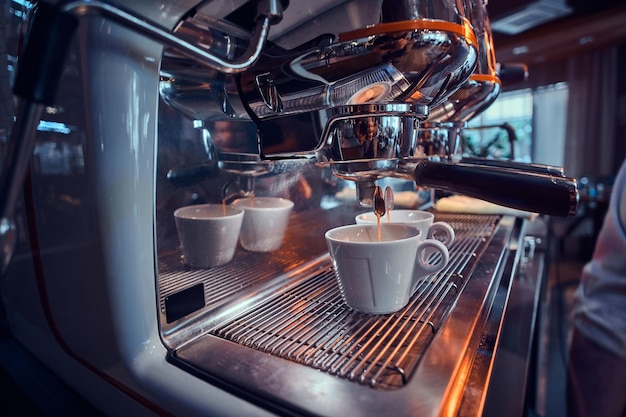 New shiny coffee machine at coffee shop is ready to start making coffee.