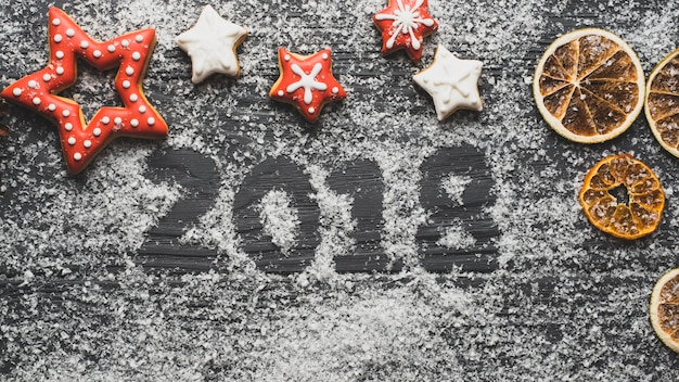 Free photo new year background with 2018 drawn in snow