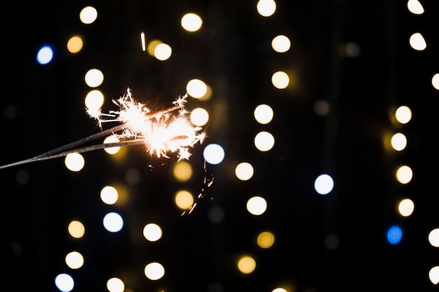 Free photo new year background with sparkler