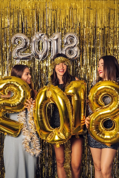 Free Photo new year celebration with party girls