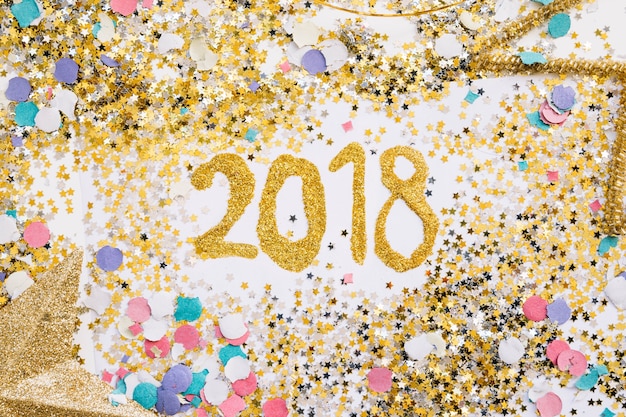 Free photo new year composition with 2018 numbers