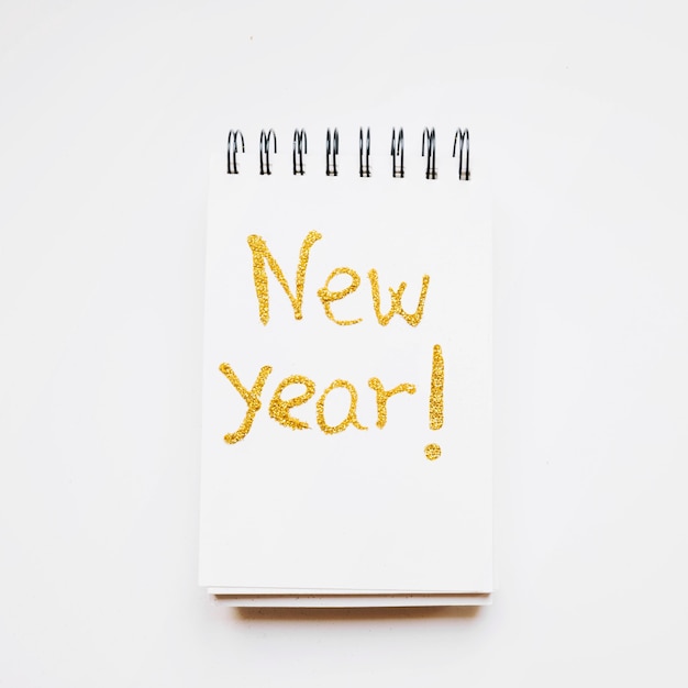 Free photo new year composition with notepad