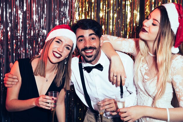 New year party concept with three friends