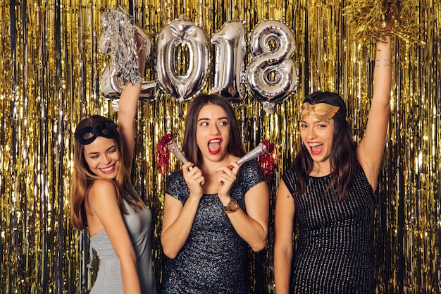 New year party with young girls dancing