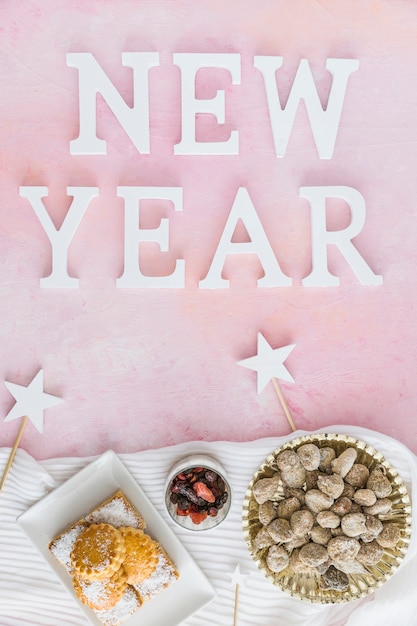 Free photo new year words and traditional sweets