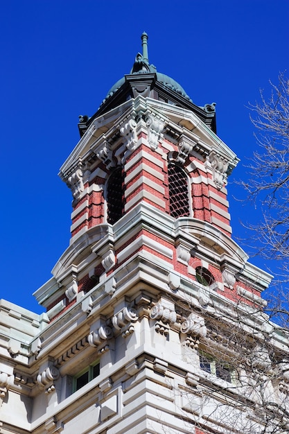 New York City Ellis Island Great Hall with blue clear sky