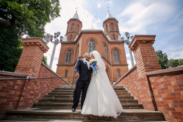 Newlywed kissing