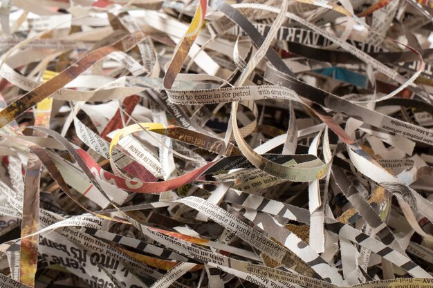 Newspaper strips messy arrangement