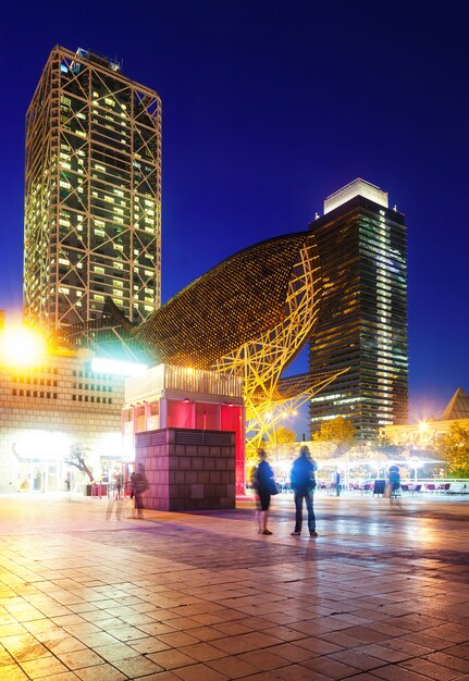 night view of skyscrapers in Port Olimpic - center of nightlife at Barcelona, Spain