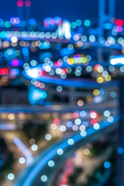 Free photo night view of urban traffic with cityscape