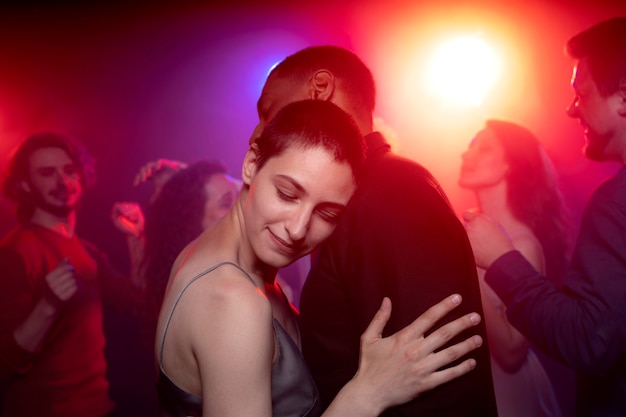 Free photo nightlife with people dancing in a club