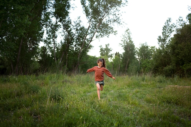 Free Photo nomad family child having fun in nature