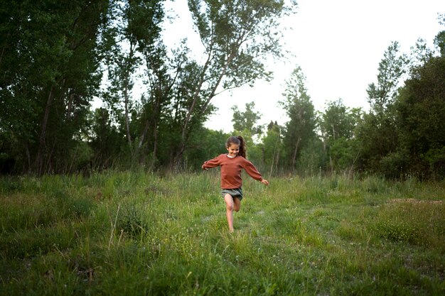 Nomad family child having fun in nature