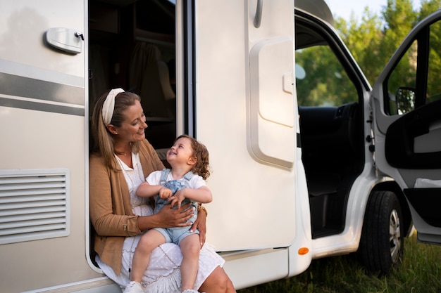 Nomad family having fun together in tiny house