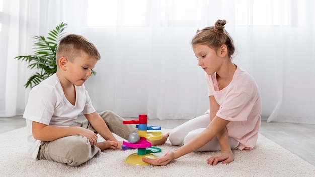 Non binary kids playing with an educational game