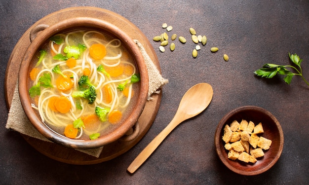 Free Photo noodle soup for winter meals and spoon