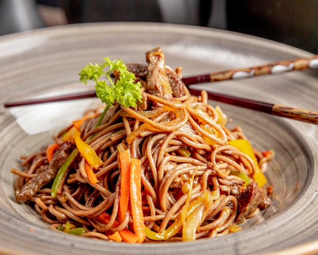 noodles prepared with meat bell peppers and sauce