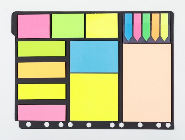 Note taking concept with colorful sticky note paper on white background top view. space for text. horizontal image