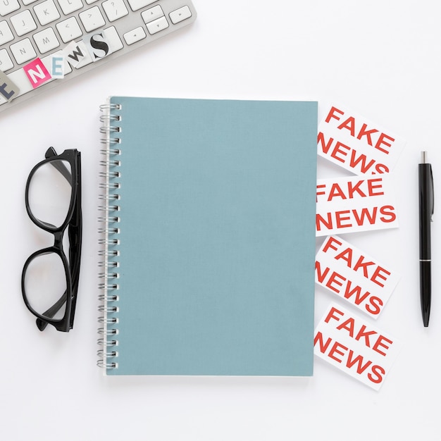 Free photo notebook with fake news