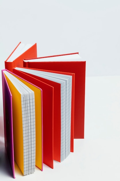 Notebooks with colorful covers arrangement