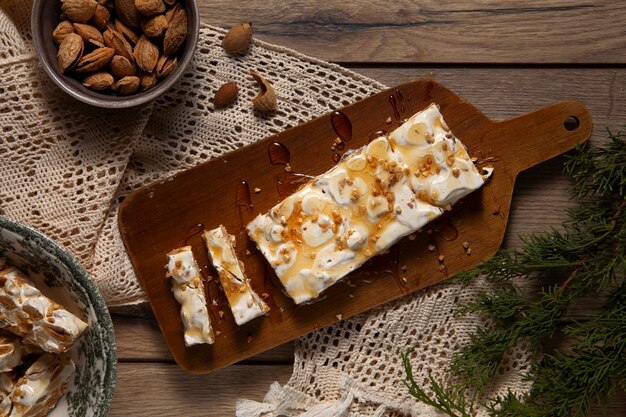 Nougats on wooden board still life