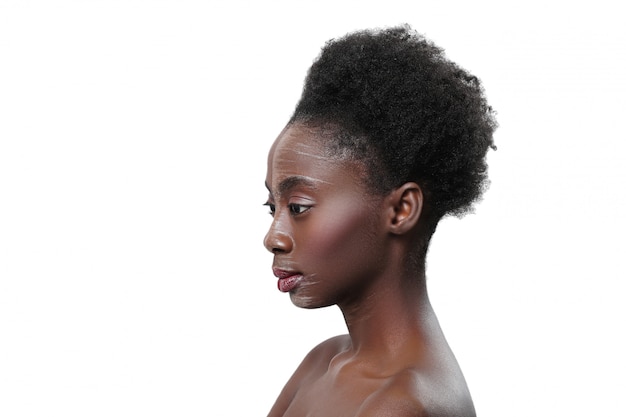 Nude black woman in profile