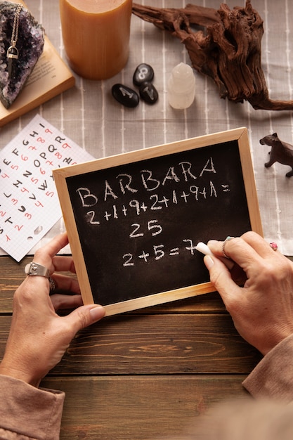 Free Photo numerology concept with blackboard flat lay