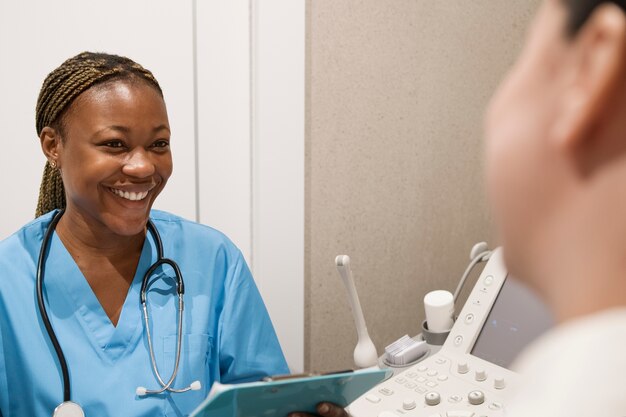 Nurse wearing scrubs while working at the clinic