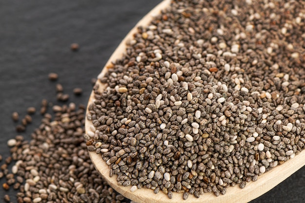 Free photo nutritious chia seeds on a spoon, close up.