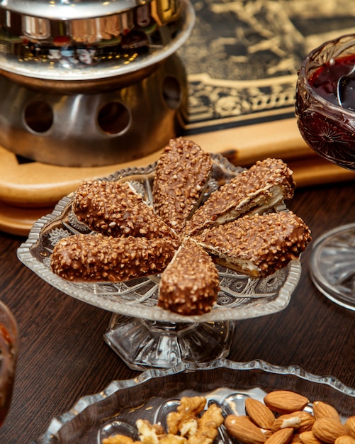 Free photo nuts chocolate dessert served in crystal dish