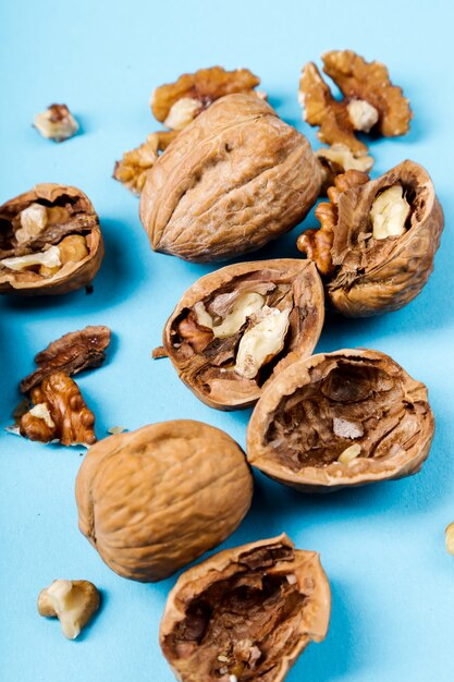 Nuts. Walnuts on a blue background