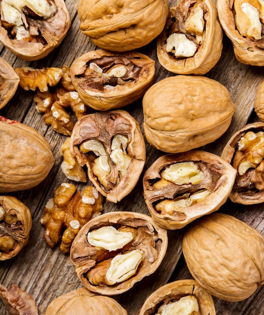 Free photo nuts. walnuts on a dark wood background