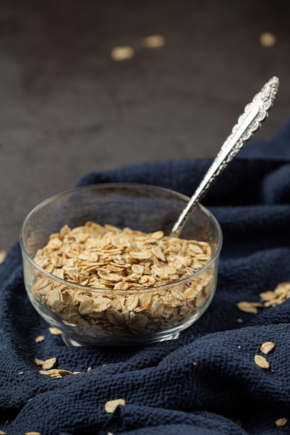 Free photo oat grains and wheat spools in containers