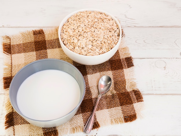 Oatmeal bowl and milk bowl