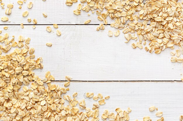 Oats on wooden table