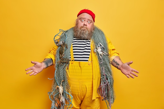 Obese bearded male sailor wiith fishing net