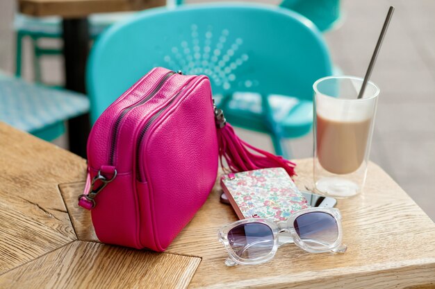 Objects arranged on table in city cafe