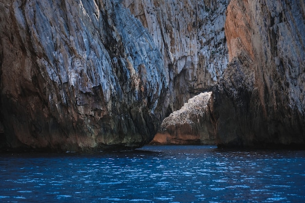 Ocean surrounded by the rocky cliffs  - great for wallpapers