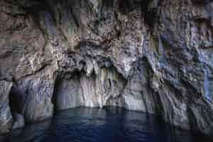 Free photo ocean water in the rocky cave