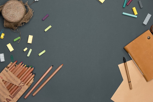 Office desk table with pencils, supplies